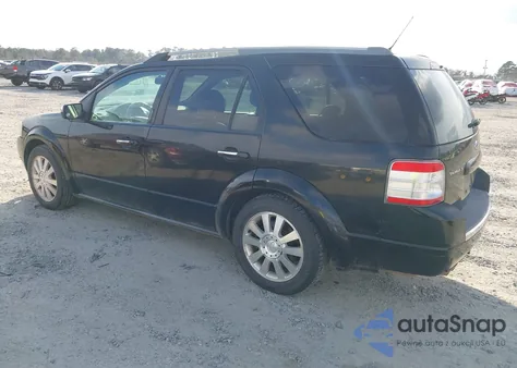 2008 Ford Taurus X Limited z USA, uszkodzony, nr VIN 1FMDK06W28GA06677